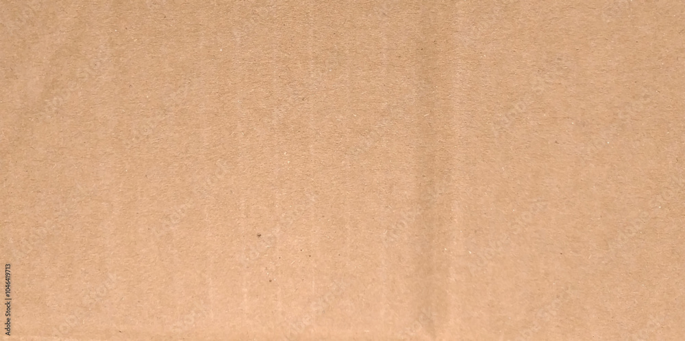 Fototapeta premium Abstract brown recycled cardboard paper texture background. 