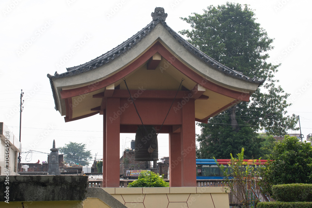 buddhist bells, also known as hanging great bells found in japanese buddhist temples used to summon the monks to prayer and to demarcate periods of time at bodh gaya, india buddhist bells, also known as hanging great bells found in japanese buddhist temples used to summon the monks to prayer and to demarcate periods of time at bodh gaya, india