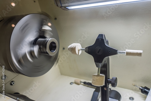 Cnc lathe for polishing surfaces.Inside view of a cnc machine. CNC lathe interior. The CNC lathe machine or Turning machine. Turning numerical control machine with tools and chuck. photo