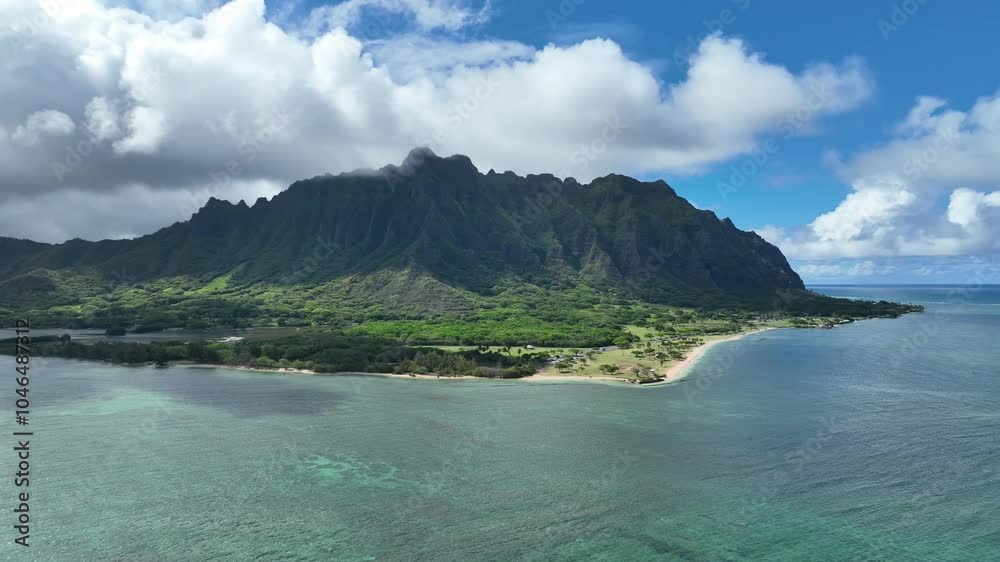 Majestic Views of Kualoa Valley near Chinamans Hat from above in Oahu Hawaii. Majestic Views of Kualoa Valley near Chinamans Hat from above in Oahu Hawaii.