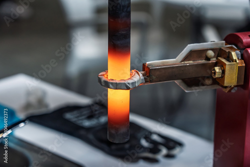 Surface hardening of steel. Induction hardening type of surface hardening . Metal part is induction-heated and then quenched. Quenched metal. Induction heating  process. Electromagnetic induction.