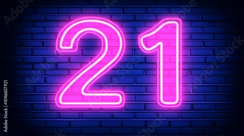 Neon pink number 21 on a dark brick wall background, representing celebration and nightlife. photo