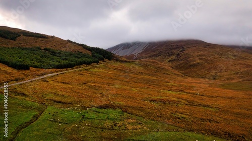 Glenveagh National Park in Donegal Ireland aerial view - The breathtaking landscape features rolling hills that gracefully descend into lush green valleys