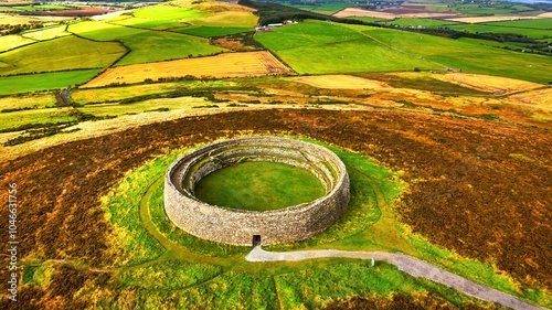 Ruins of Grianan of Aileach in Ireland - an Ancient Stone Structure That Is Beautifully Surrounded by Lush Green Fields and Nature photo