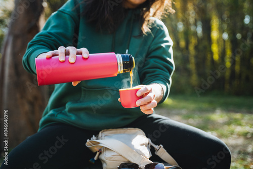 Quadro em tela Sipping on warm drinks in a beautiful natural setting creates a perfect cozy sce