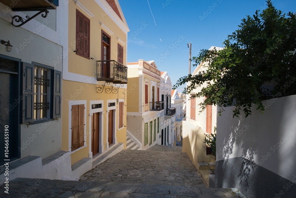 Fototapeta premium Mediterranean village street with colorful buildings.