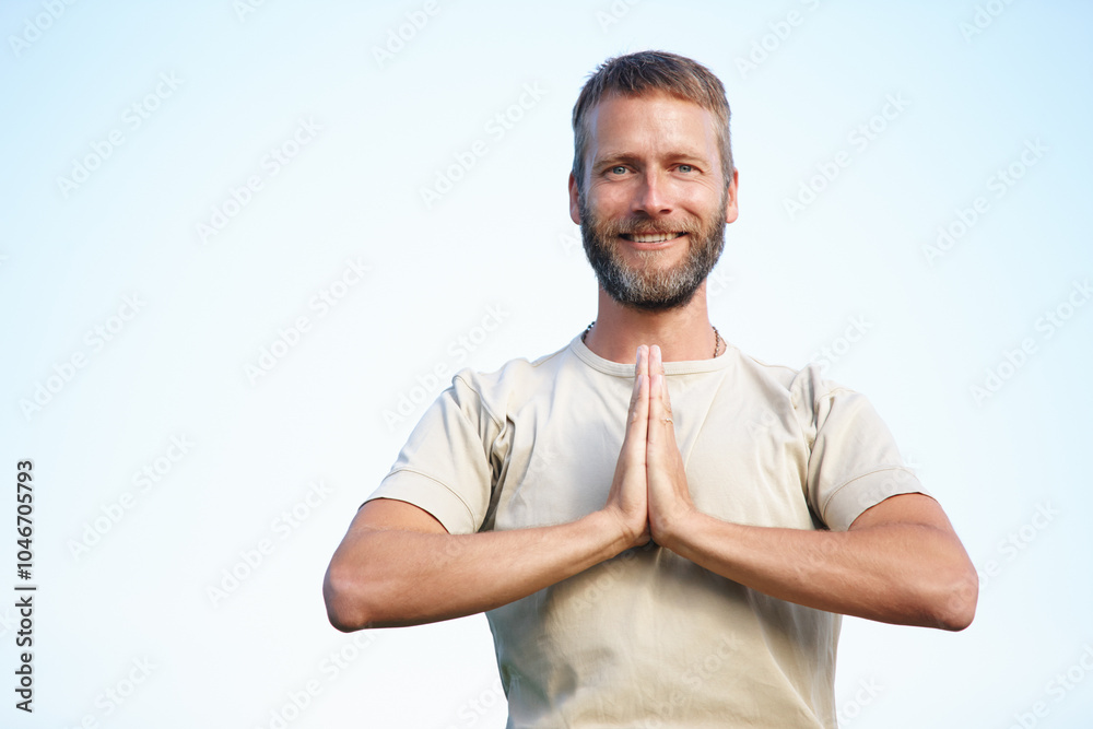 Yoga, portrait and man with namaste outdoor for exercise, mindfulness and fitness. Mature face, happy yogi and prayer hands for spiritual health, body wellness and meditation for peace by blue sky