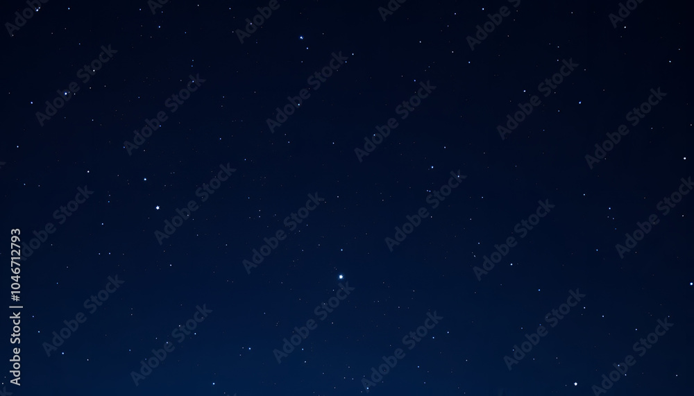 Fototapeta premium Starry night sky filled with twinkling stars on a dark blue background