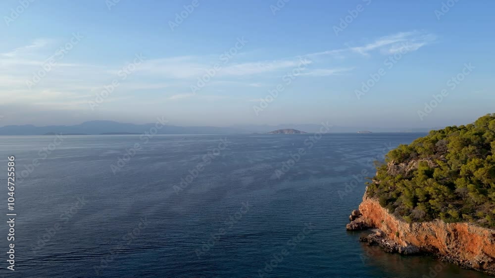 Forward drone flight toward blue ocean from island at sunset Forward drone flight toward blue ocean from island at sunset