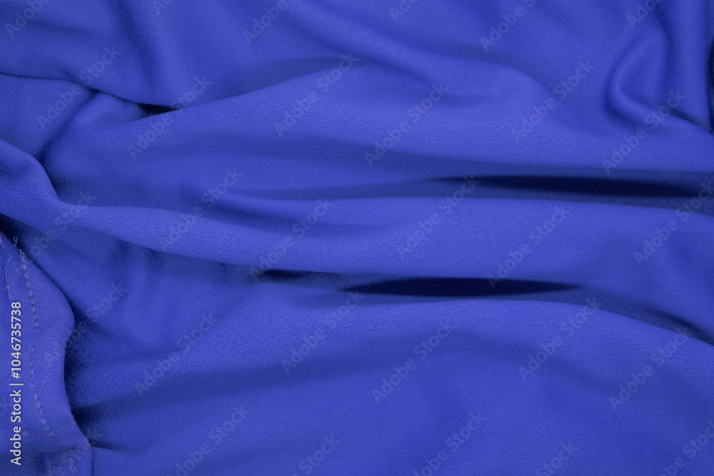 Abstract texture a wrinkled navy blue blanket Abstract texture a wrinkled navy blue blanket