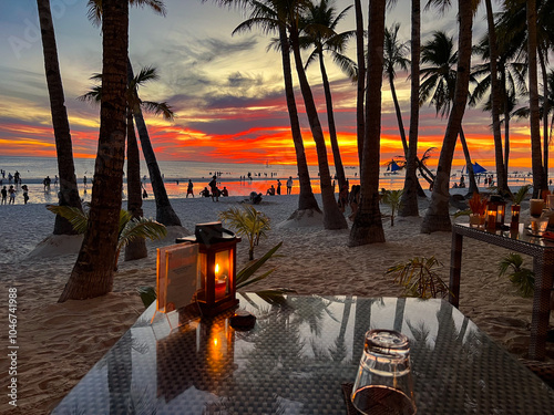 Colorful sunset on Boracay Island observed from a beach restaurant