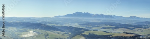 Obraz na płótnie Panorama of the Tatra Mountains seen from the Pieniny Mountains. Long focal length. A beautiful sunny slightly foggy day. w salonie