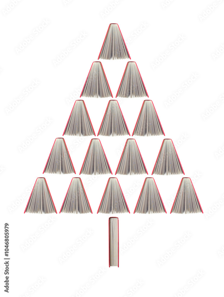 A creative arrangement of open books forming a Christmas tree isolated on a white background. A creative arrangement of open books forming a Christmas tree isolated on a white background.