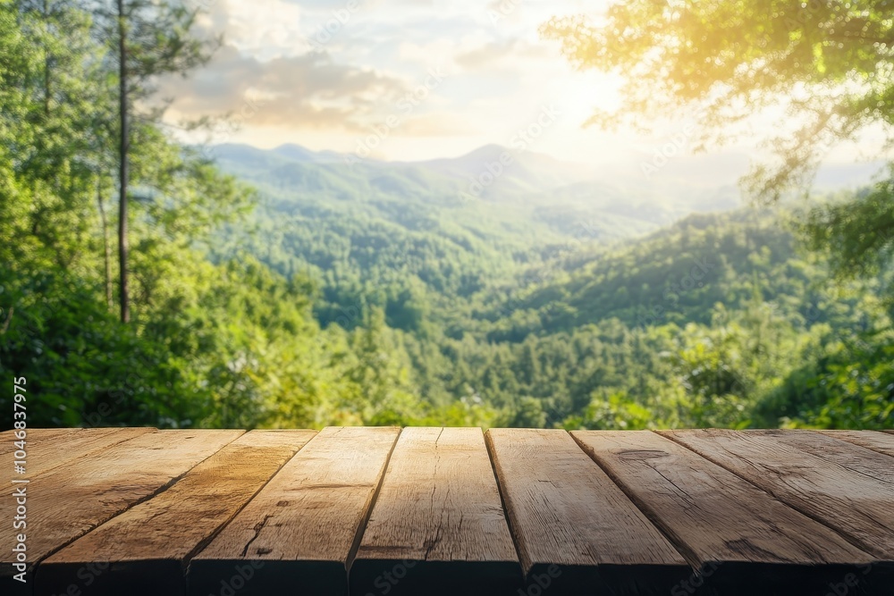 Wooden table top with a blurry background of a green mountain range under a sunny sky. Wooden table top with a blurry background of a green mountain range under a sunny sky.