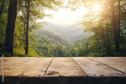 Wooden table with blurry green mountain range and sunbeams in the background. photo