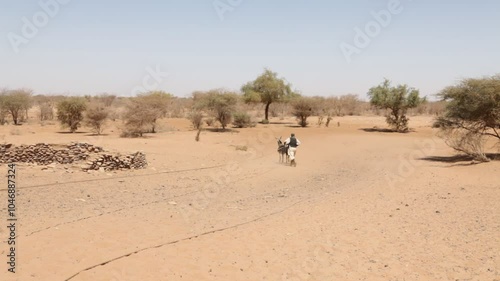 Sudan, Nubia, Naga, people taking water from a well in the desert photo