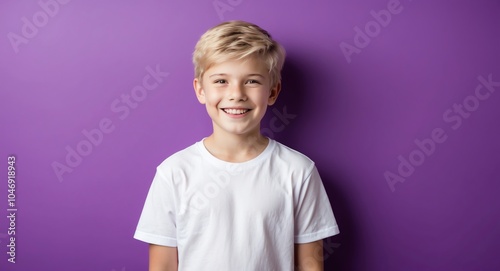 blonde teen boy purple background wearing plain white tshirt smiling happy portrait photo