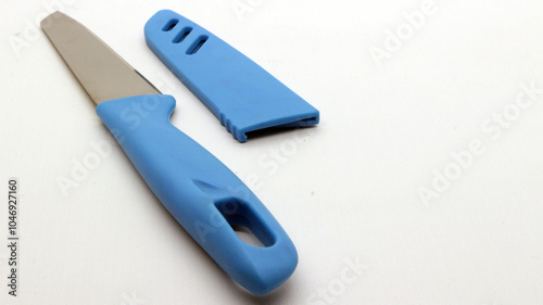 Blue knife with cover isolated