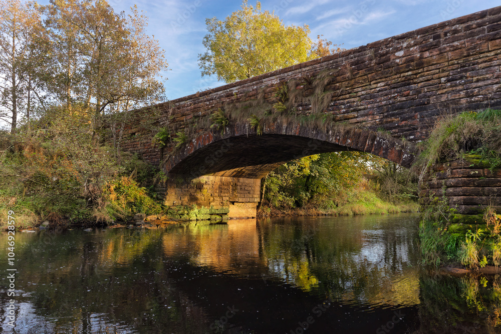 Old sandstone Lugar Bridge carrying Mill Street over Lugar Water in Ochiltree East Ayrshire Old sandstone Lugar Bridge carrying Mill Street over Lugar Water in Ochiltree East Ayrshire