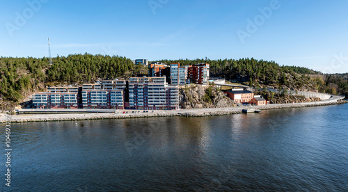 Waterfront apartment houses at the cliff Telegrafberget in the district Nacka, a sunny spring day in Stockholm
 photo