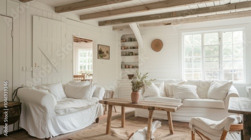 A cozy and inviting living space featuring a minimalist white canvas setting  Showcasing minimalist furniture arrangements for a warm and welcoming ambiance