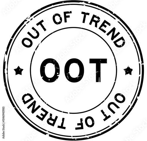 Grunge black OOT out of trend word round rubber seal stamp on white background
