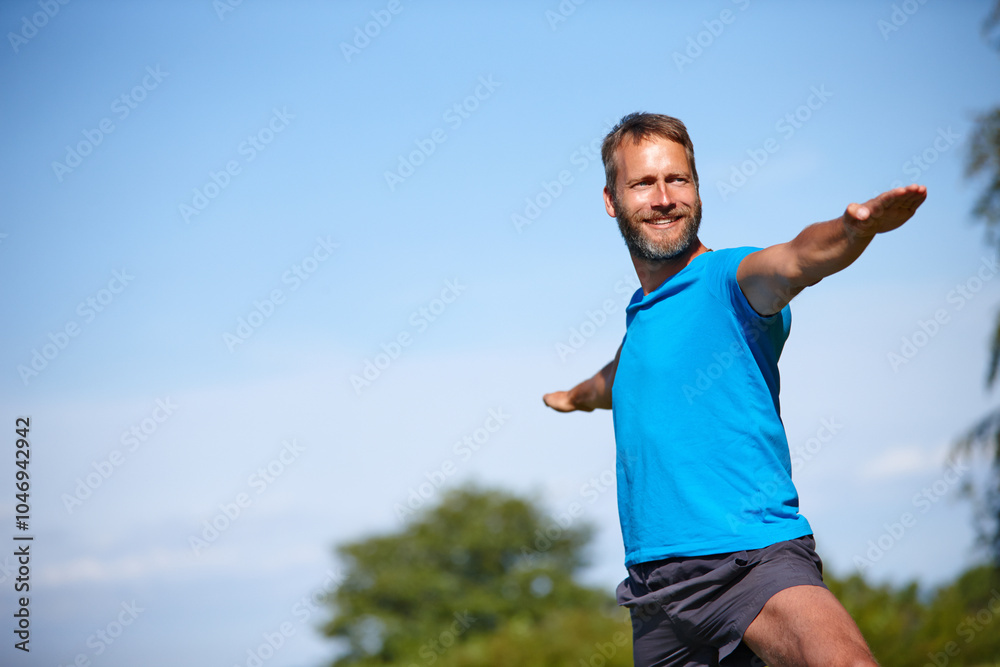 Nature, man or stretching outdoor with yoga for exercise, balance or mobility at park. Pilates, mature yogi or warrior pose with smile for workout, holistic wellness or posture with fitness on mockup Nature, man or stretching outdoor with yoga for exercise, balance or mobility at park. Pilates, mature yogi or warrior pose with smile for workout, holistic wellness or posture with fitness on mockup