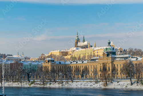 Photography Cold winter morning in Prague, snow in the city and Prague castle