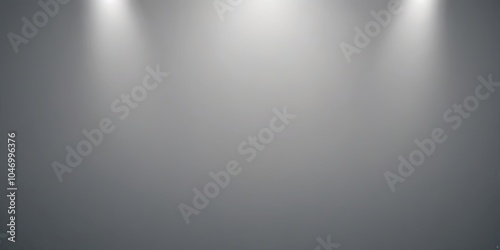 A gray background with three lights shining on it photo