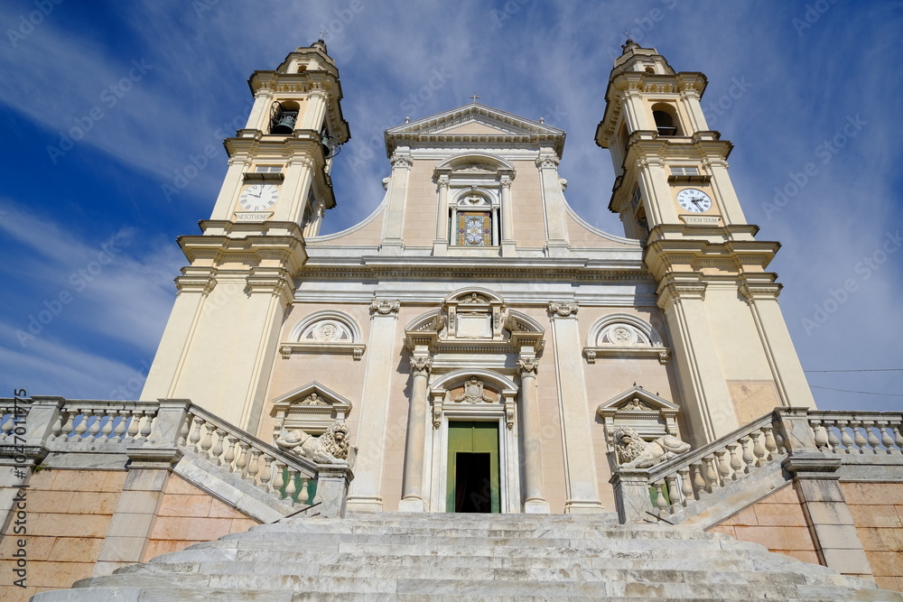 Fototapeta premium Ligurian city. Staircase with lion sculptures.White marble statues in front of the church of Santo Stefano. Italy