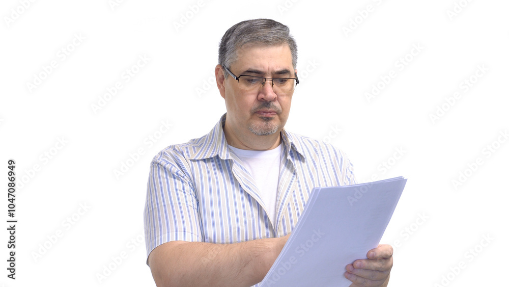 Man in Glasses Reading Business Documents Man in Glasses Reading Business Documents