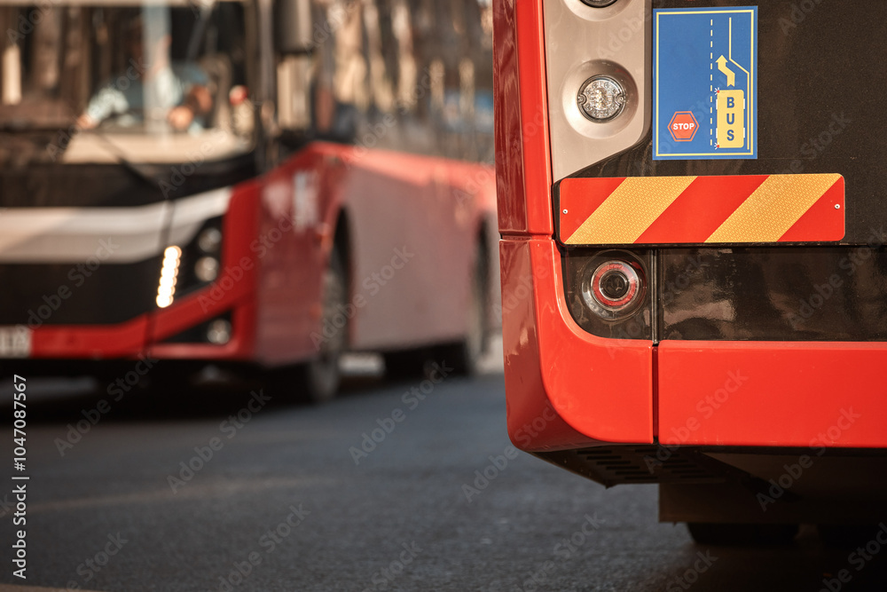 Naklejka premium Red bus for public transportation parked on a station.