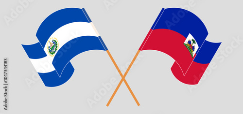 Crossed and waving flags of Republic of El Salvador and Republic of Haiti. Vector illustration