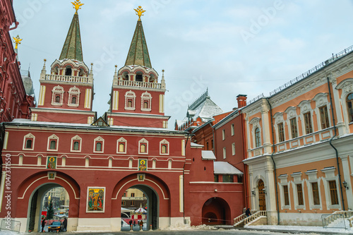 Exit from the Red Square through the double Iversky gate. The Resurrection Gate in Moscow. The entrance to the Red Square is through the gate from the side of the main Moscow street — Tverskaya.