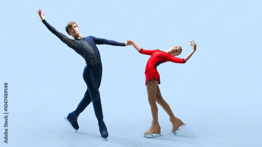 Fototapeta premium Impressive figure skating lift, showcasing the strength and grace of the skaters against cold blue background. Artistry in ice dance. Concept of winter sport, elegance and grace, championship. Ad