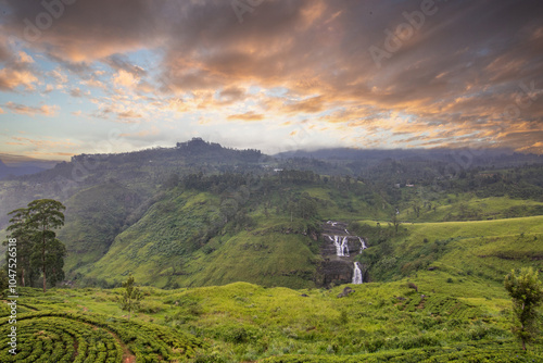 Waterfalls in the highlands, jungle, fields and tea plantations paint the picture in this region. Green landscape shot in cloudy weather between Kandy and Nuwara Eliya, Sri Lanka, Asia photo