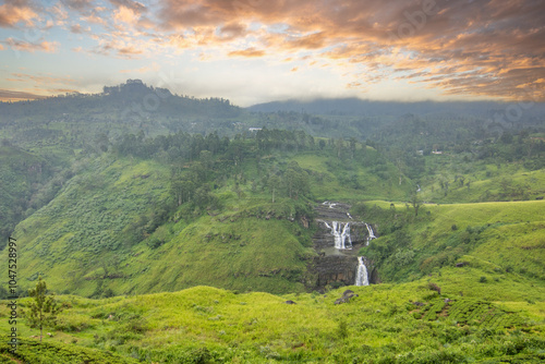 Waterfalls in the highlands, jungle, fields and tea plantations paint the picture in this region. Green landscape shot in cloudy weather between Kandy and Nuwara Eliya, Sri Lanka, Asia photo