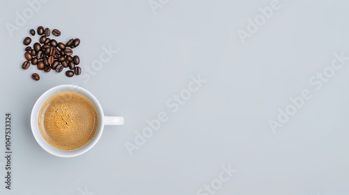 Cup of coffee with scattered coffee beans on a light gray background, offering copy space for coffee-themed visuals, beverage concepts, or cafe marketing elements, perfect for coffee branding.

 photo