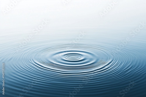 A large blue circle of water with ripples