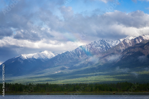 Landscape with mountains and rainbow. Buryatia, Tunkinskaya Valley