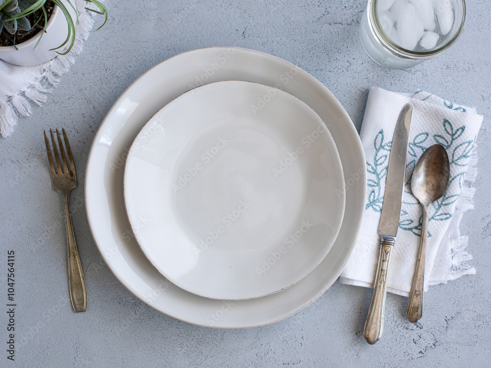 elegant place setting on a gray countertop elegant place setting on a gray countertop