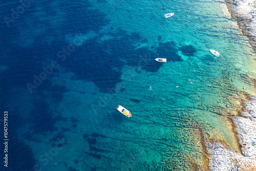 Croatia, Istria, Pula, aerial view to coastline with boats and seaground photo