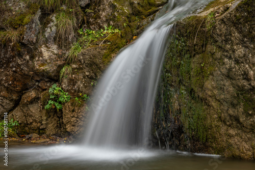 Small waterfall near Jaworki village of Biala Woda creek in autumn day photo