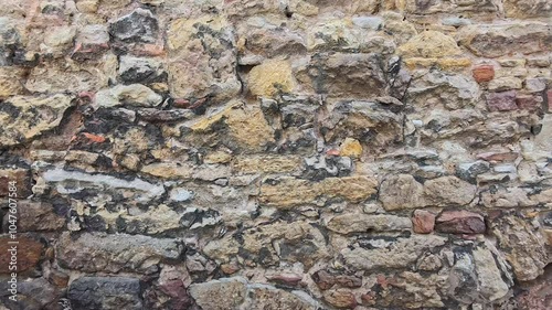 Exploring the Ancient Stone Wall Structure in a Historic Urban Setting