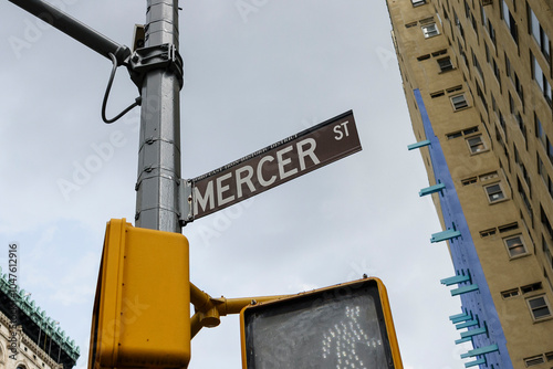 Mercer Street sign in Soho Cast Iron Historic District New York city. photo