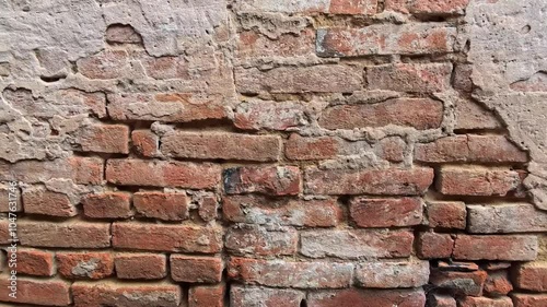 Exploring the Textures of an Old Brick Wall in an Urban Setting