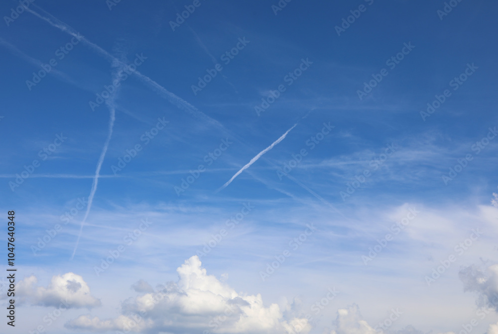 white chemtrails contrast against the blue sky and some people already think of a global conspiracy white chemtrails contrast against the blue sky and some people already think of a global conspiracy