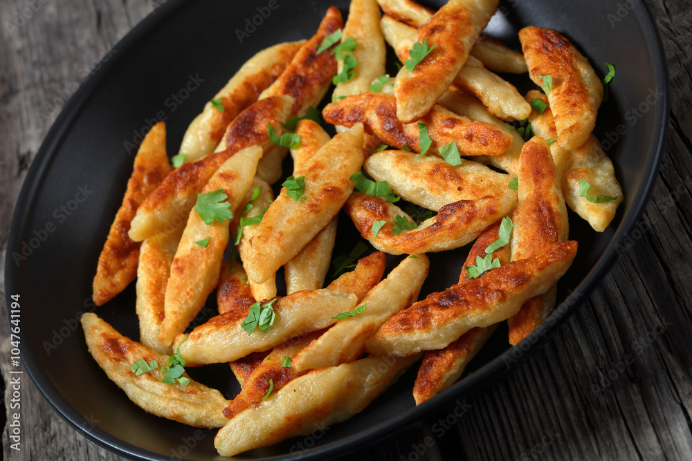 Schupfnudeln, German potato noodles in a skillet Schupfnudeln, German potato noodles in a skillet