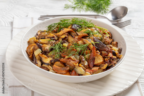 fried blend of wild mushrooms in a bowl photo