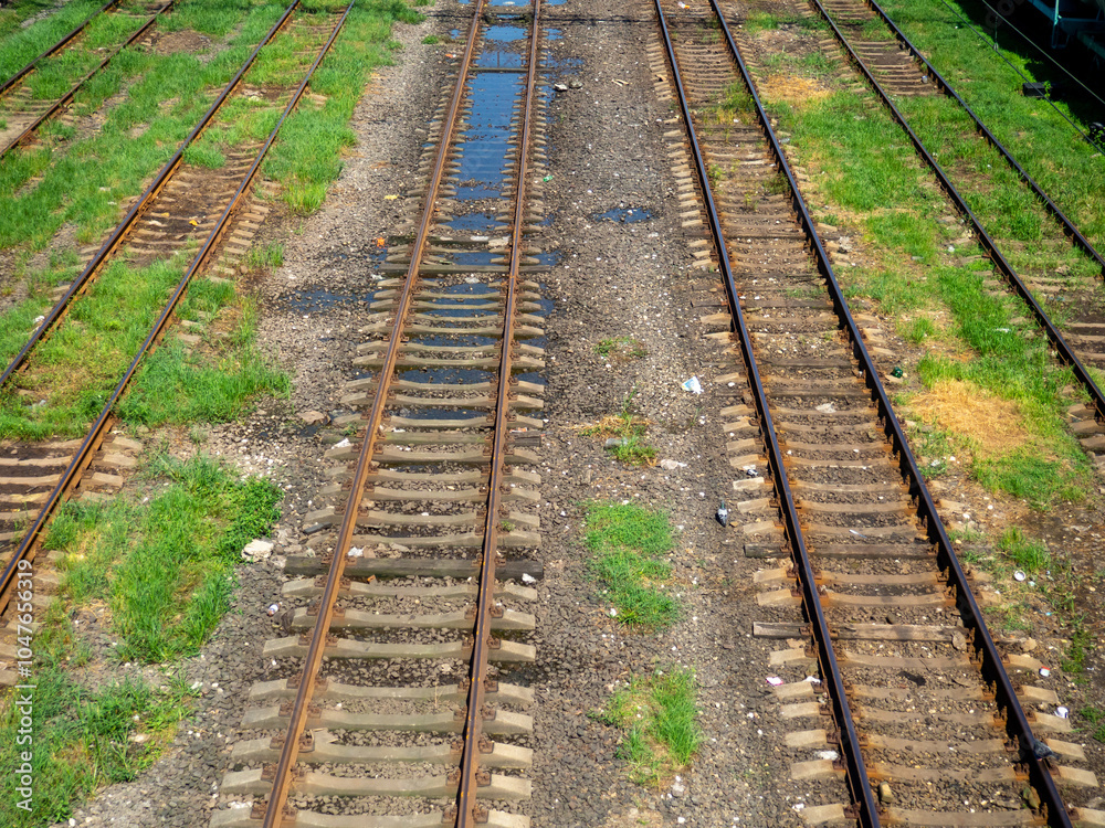 Rails with sleepers. Many tracks. Railway tracks. Railway crossing. Rails with sleepers. Many tracks. Railway tracks. Railway crossing.